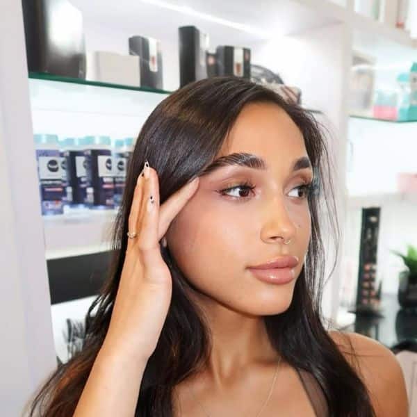 a woman after a brow lamination service at Face Brow and beauty Bar Midtown Miami